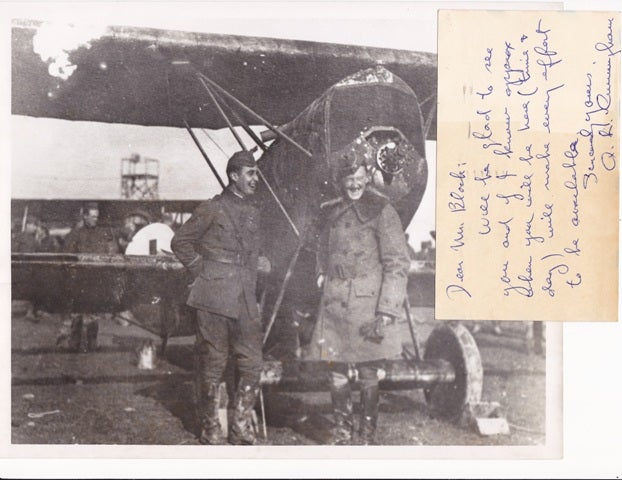 Item #23003 Photographic copyprint of a war period snapshot, 10" x 8", of Cunningham and another man standing in front of a plane. An autograph postcard is included, "Dear Mr Block, Will be glad to see you and if I know approx when you will be here (time & day) will make every effort to be available. Sincerely yours, A. L. Cunningham." A. Lawrence CUNNINGHAM.