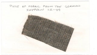 Fabric piece, 2 3/4" x 1 1/2", from the German Zeppelin L-49 that was shot down at Bour-Les-Bain, October 9, 1917.